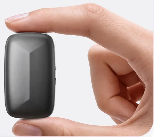 Memoket Gem held between fingers